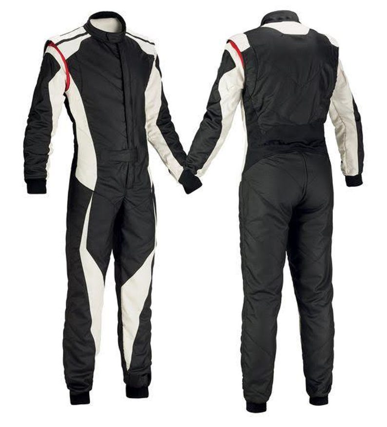 May include: A black and white racing suit with a high collar and long sleeves. The suit features white panels on the sides and sleeves, with red accents. The suit is designed for motorsports and is shown from the front and back.