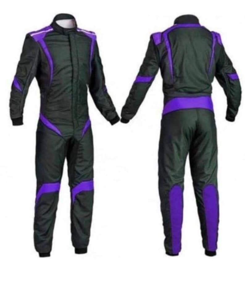 May include: A black racing suit with purple accents. The suit features a zip-up front, long sleeves, and a stand-up collar. Purple stripes and panels are strategically placed on the shoulders, arms, legs, and waist. The suit is designed for motorsports.