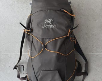 black leather backpack gold zip Leather Backpack