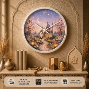 May include: A round wall clock with a white frame, featuring a 10-inch by 10-inch face depicting a mosque at night with a crescent moon, stars, and floral garden. The clock includes a metal mechanism with silent movement and a wood frame.