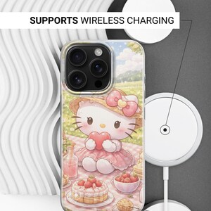 May include: Clear phone case with a cartoon character in a pink dress and hat, holding a heart. The case has a picnic scene background. Text reads "SUPPORTS WIRELESS CHARGING" and "SIDES ARE NOT PRINTED".