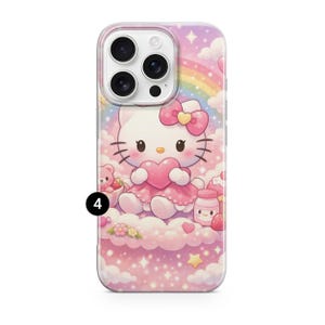 May include: A phone case with a cartoon cat design, holding a pink heart, set against a pastel sky with a rainbow. The design includes clouds, stars, and a small teddy bear.