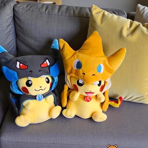 Pikachu Cosplay Plush - Pikachu Dressed as Charizard, Garchomp and Snorlax (20-25 cm)