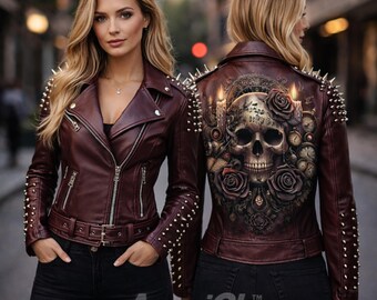May include: Burgundy leather jacket with silver spike studs on the shoulders and sleeves. The back of the jacket features a skull and rose design. The jacket has a zipper closure and a belt. The text "AmeriGlo" is at the bottom.