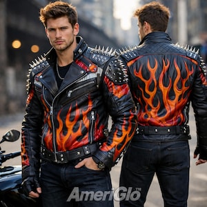May include: Black leather jacket with orange and red flame design. The jacket has silver spikes on the shoulders and a quilted back. It features a zip closure and a waist belt. The AmeriGlo logo is visible at the bottom.