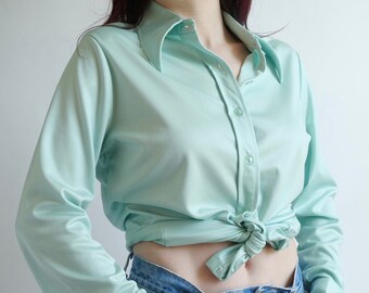 teal green blouse