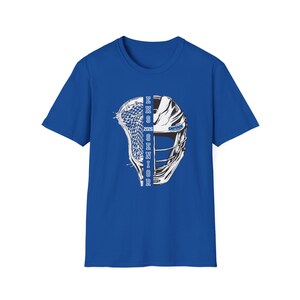 May include: Royal blue t-shirt featuring a lacrosse helmet graphic. The graphic is split vertically, with the left side showing the lacrosse net and the right side showing the helmet. The text "EHS SENIOR 2026 CAPTAIN" is printed on the graphic.