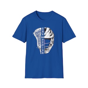May include: Royal blue t-shirt featuring a lacrosse helmet graphic. The graphic is black and white, with the text "EHS SENIOR 2026" vertically down the center. The shirt is a classic crew neck style.