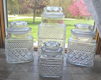 Anchor Hocking Set of 4, 1 - Flour Canisters and 2 - Coffee / Tea Canister 1- Small 0ne Canister.