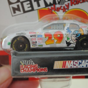 1997 Edition Racing Champions Jeff Green Cartoon Network 29 Die Cast 1:64 Scale Car Collector Card and Display Stand