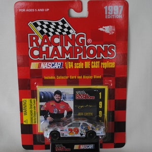 1997 Edition Racing Champions Jeff Green Cartoon Network 29 Die Cast 1:64 Scale Car Collector Card and Display Stand