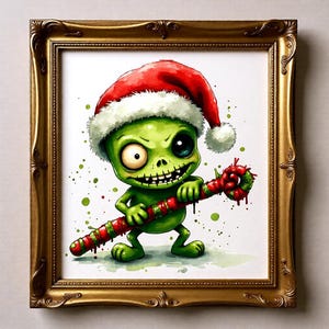 May include: A framed watercolour print of a green zombie character wearing a Santa hat and holding a red and green candy cane. The artwork has a whimsical, cartoonish style with a gold ornate frame. The background is white with green paint splatters.