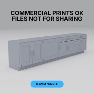 May include: A light gray cabinet with multiple doors and drawers. The cabinet has a rectangular shape and is set against a gray background. Text at the top reads "COMMERCIAL PRINTS OK FILES NOT FOR SHARING". A blue button at the bottom says "0.4MM NOZZLE".