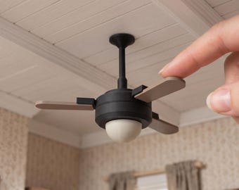 May include: A miniature ceiling fan with a black central motor housing, three light brown blades, and a white dome-shaped light fixture. The text DIGITAL STL FILES - NO PHYSICAL ITEM and INSTANT DOWNLOAD are visible.
