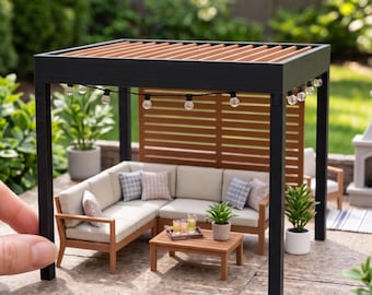 May include: A miniature pergola model with a black frame and brown slatted roof, featuring string lights, a sectional sofa with beige cushions, a wooden coffee table, and potted plants. Text reads: DIGITAL STL FILES - NO PHYSICAL ITEM.