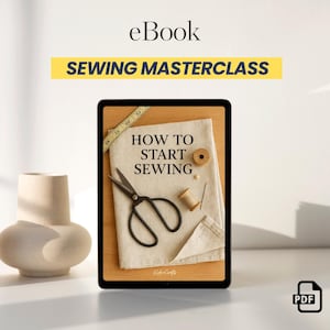May include: An eBook cover titled "Sewing Masterclass" with the text "How to Start Sewing." The image includes scissors, thread, a measuring tape, and a spool of thread. A PDF icon is in the bottom right corner. A beige vase is on the left.