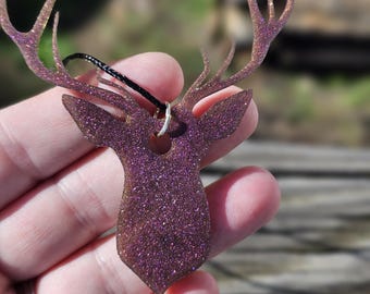 Buck deer head rearview mirror decoration.