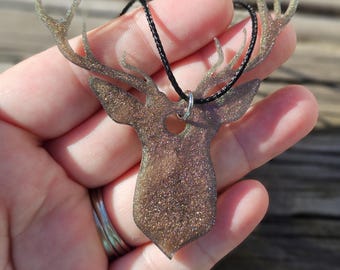 Buck deer head rearview mirror decoration.
