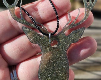 Buck deer head rearview mirror decoration.