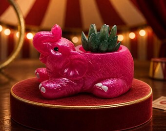 Maceta para suculentas con forma de elefante rosa intenso, figura decorativa.