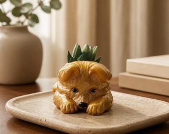Adorable figura de cachorro con maceta para suculentas.