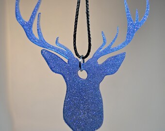 Buck deer head rearview mirror decoration.