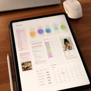 May include: A digital tablet displaying a life planner interface with sections for navigation, productivity, wellness, daily habits, a personal profile, and a monthly calendar. The screen shows text including life planner, productivity, wellness, and daily habits.
