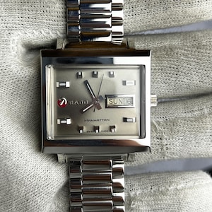 RADO Manhattan Vintage rektangulär klocka | Rostfritt stål dag- och datum schweizisk kvarts