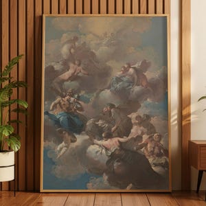 May include: A framed classical painting featuring figures in flowing robes amidst clouds. The artwork has a warm color palette with hues of blue, beige, and brown. The painting is displayed in a room with wooden paneling and a potted plant.