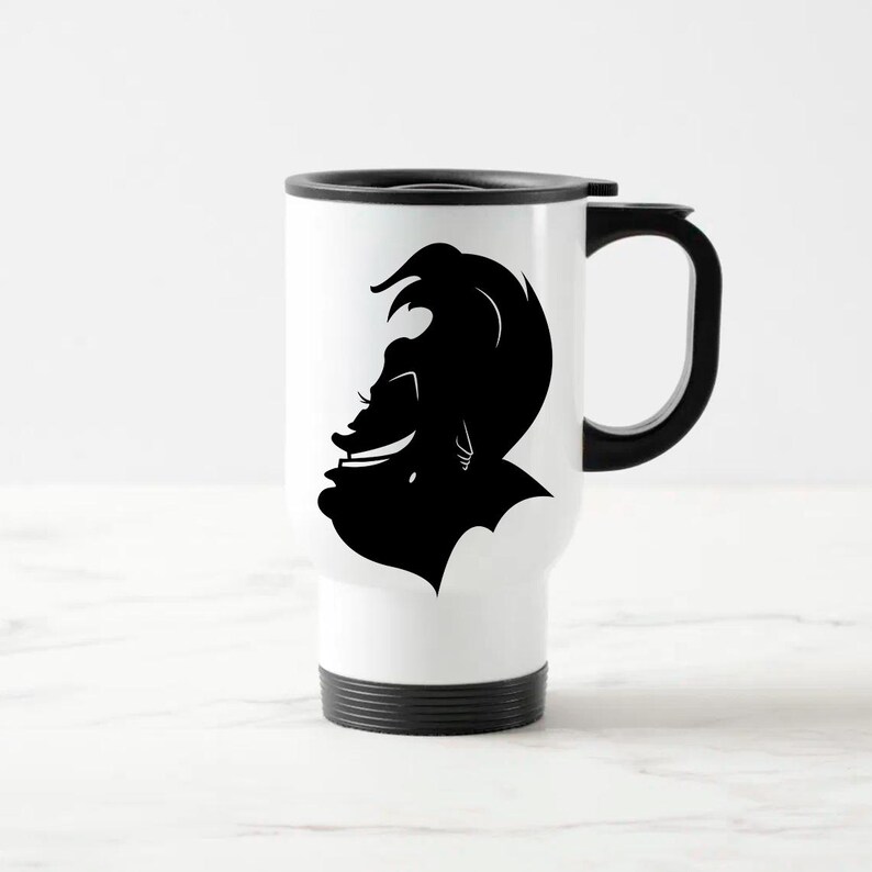 May include: White travel mug with a black silhouette of a person's profile. The mug has a black handle, a black lid, and a black base. The profile is a stylized image of a person with a distinctive hairstyle and facial features.