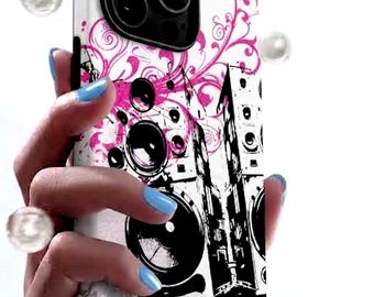 May include: A white smartphone case featuring a black and white graphic illustration of two large audio speakers. The design is accented with vibrant pink swirling floral patterns and abstract ink splatters, covering the back of the device.