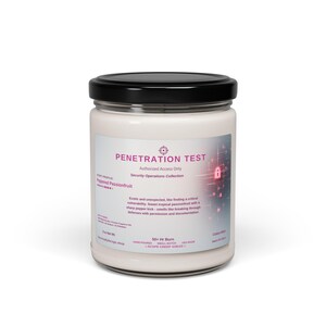 May include: A white glass jar candle with a black lid. The label reads "PENETRATION TEST" and "Authorized Access Only." The candle is scented with passionfruit and has a 50+ hour burn time.