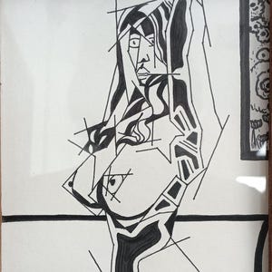 May include: Black and white abstract art print of a female figure. The artwork features bold lines and geometric shapes, creating a modern and stylized representation. The figure is framed in a wooden frame.