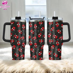 Three Spider-Man-themed stainless steel tumblers with a black and red spider web pattern.