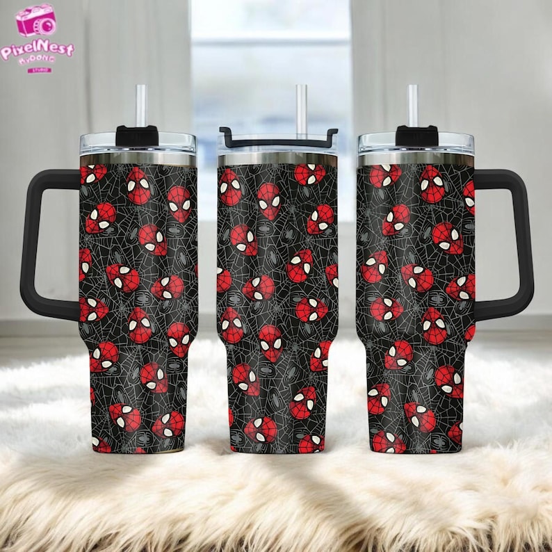 Three Spider-Man-themed stainless steel tumblers with a black and red spider web pattern.
