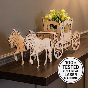 May include: A wooden horse-drawn carriage with two horses, a carriage, and two large wheels. The carriage holds yellow flowers. The text on the image says "100% TESTED ON A REAL LASER MACHINE."