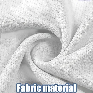The image is a close-up of a white fabric material, possibly a mesh football jersey.