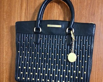 Black and Gold Donna karen bag with gold studs in zipper closure
