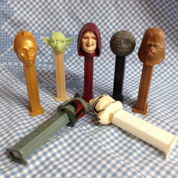 Star war character Pez dispensers  7 vintage toy candy holders