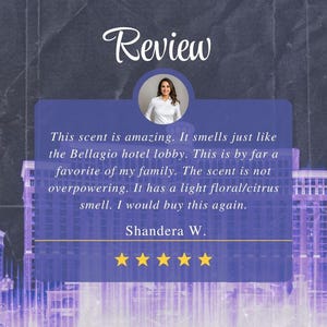 May include: A customer review for a product with a five-star rating. The review reads: "This scent is amazing. It smells just like the Bellagio hotel lobby. This is by far a favorite of my family. The scent is not overpowering. It has a light floral/citrus smell. I would buy this again." The review is signed "Shandera W."