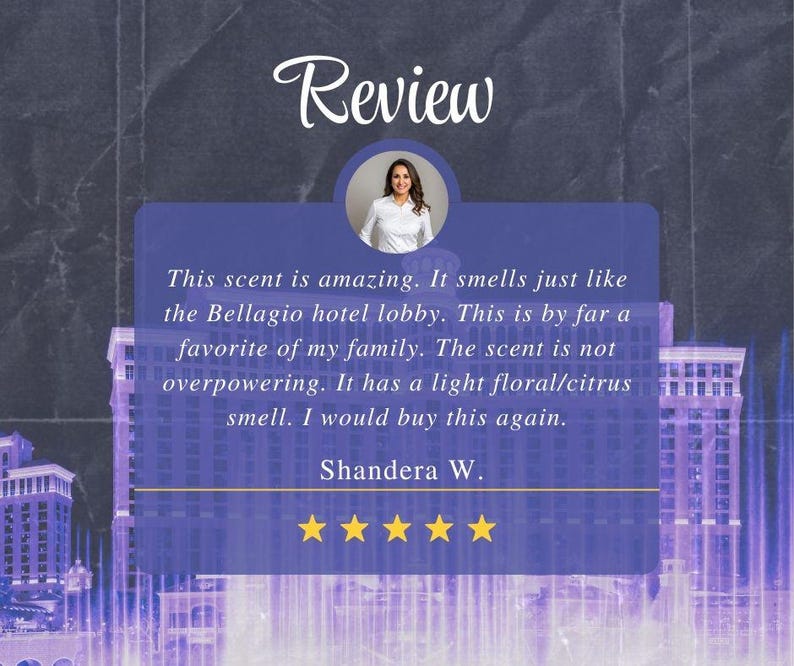 May include: A customer review for a product with a five-star rating. The review reads: "This scent is amazing. It smells just like the Bellagio hotel lobby. This is by far a favorite of my family. The scent is not overpowering. It has a light floral/citrus smell. I would buy this again." The review is signed "Shandera W."