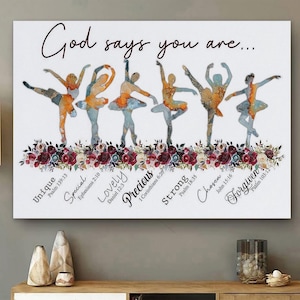 May include: A canvas print featuring watercolor ballet dancers in various poses, with the text "God says you are..." above them. Below the dancers are the words "Unique, Special, Lovely, Precious, Strong, Chosen, Forgiven."