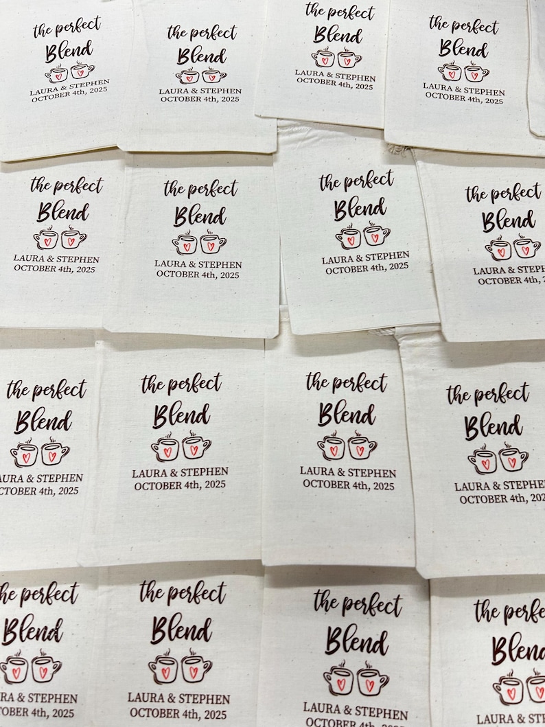 May include: Off-white canvas favor bags with the text "the perfect Blend" in a script font, and two coffee cup illustrations with hearts. The bags are personalized with "LAURA & STEPHEN OCTOBER 4th, 2025".