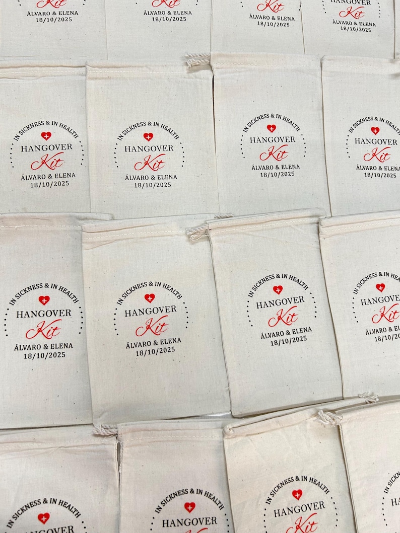 May include: Cream-coloured drawstring bags, each printed with the words "IN SICKNESS & IN HEALTH HANGOVER Kit" in red, along with the names "&Aacute;lvaro & Elena" and the date "18/10/2025".