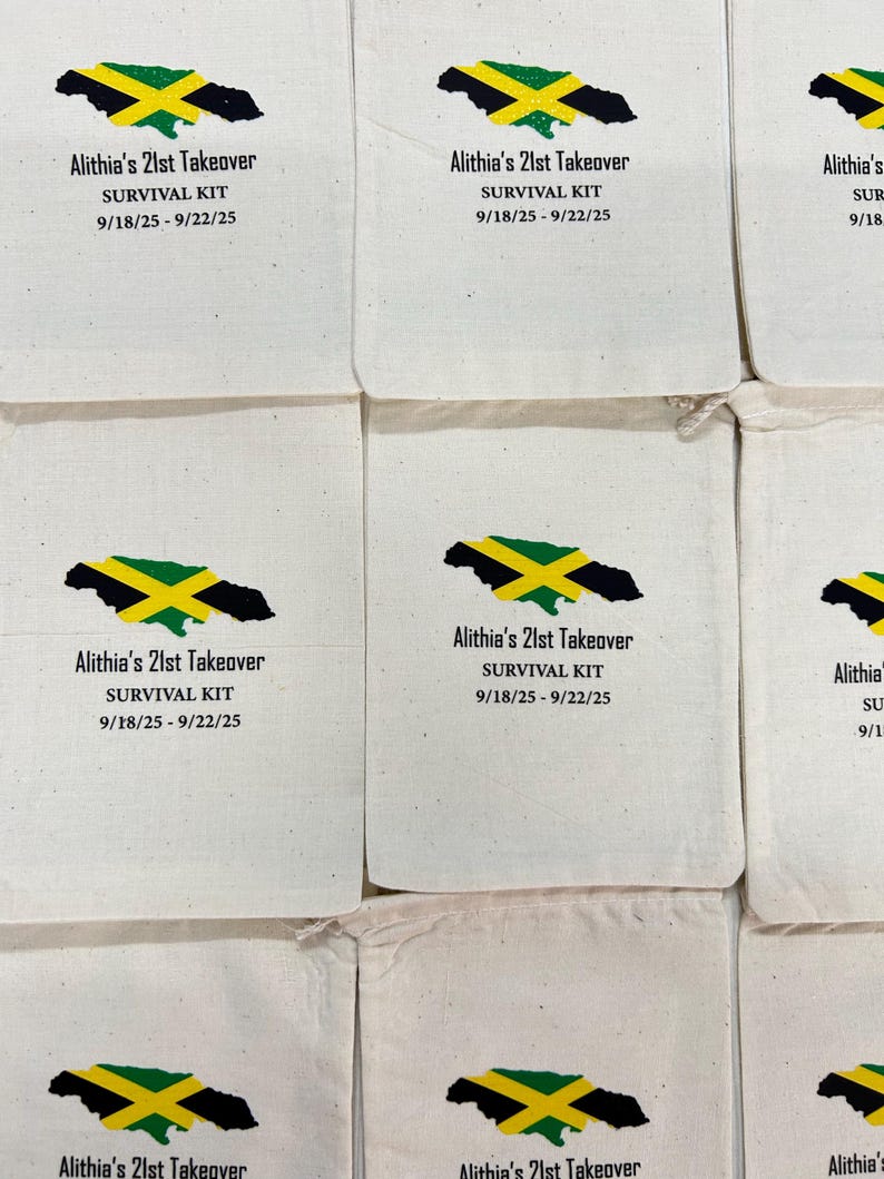 May include: Multiple off-white fabric bags, each printed with a Jamaican flag design and text. The design includes a black silhouette of Jamaica, a yellow cross, green stripes, and the text "Alithia's 21st Takeover SURVIVAL KIT 9/18/25 - 9/22/25."