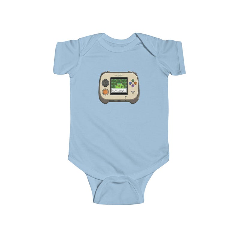 May include: Light blue baby bodysuit featuring a retro handheld video game graphic. The game console is beige with a green screen displaying a pixelated landscape. It has orange and colorful buttons. A fun and nostalgic design for infants.