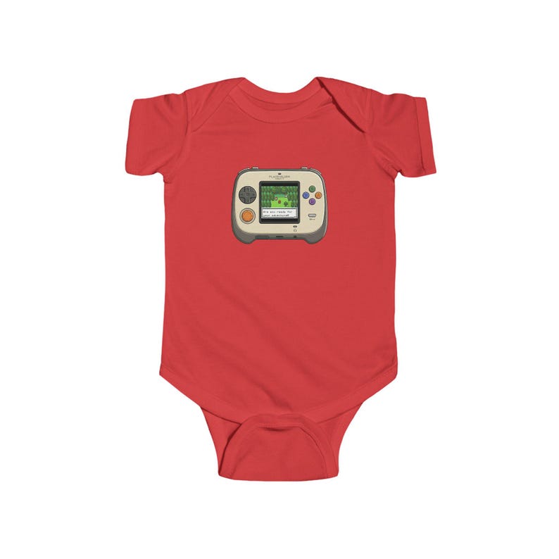 May include: A red baby bodysuit featuring a graphic of a retro handheld video game console. The console is gray and beige with a green screen displaying a pixelated landscape. The bodysuit is made of soft material.