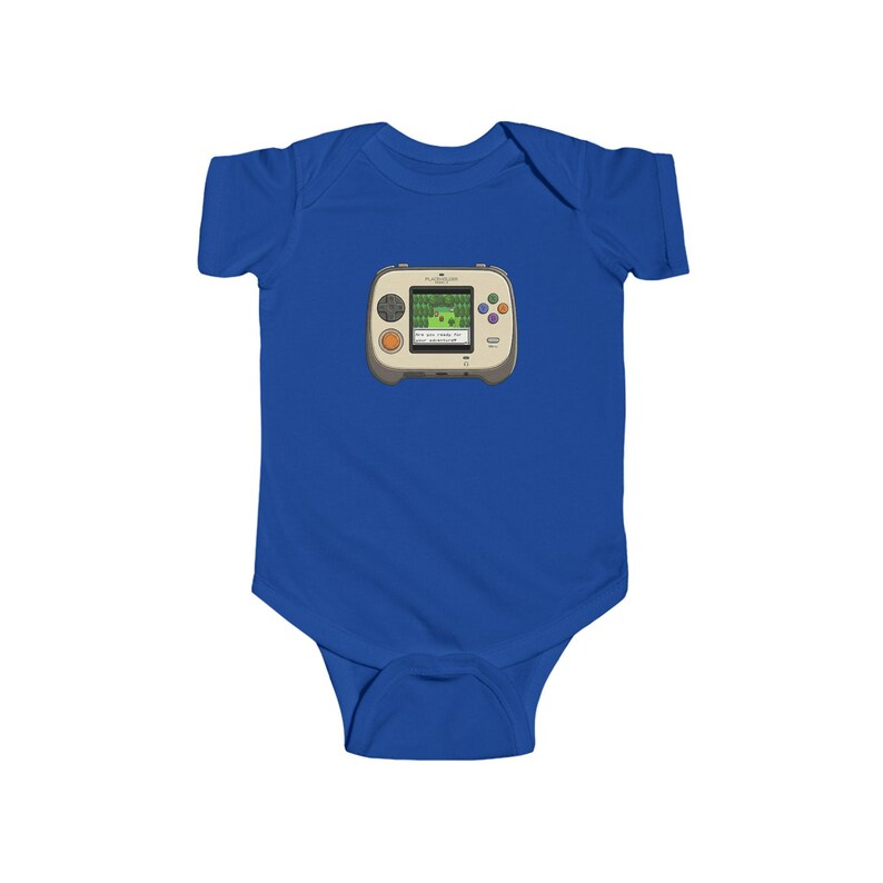 May include: A royal blue baby bodysuit featuring a graphic of a retro handheld video game console. The console is beige with a green screen displaying a pixelated game scene. It has orange and colorful buttons.