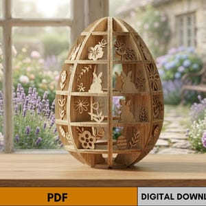 May include: A wooden Easter egg-shaped shelf with cut-out designs of flowers, bunnies, and eggs. The shelf is made of light brown wood and sits on a wooden surface. The background shows a window with a garden view and the text "PDF DIGITAL DOWNLOAD".