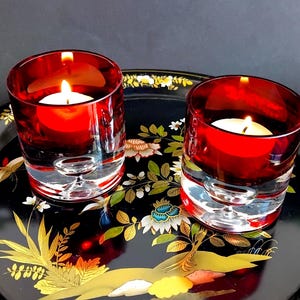 May include: A rustic wooden sign with the text "Welcome to our home" in white lettering. The sign features a distressed finish and a simple, inviting design, perfect for a front porch or entryway.